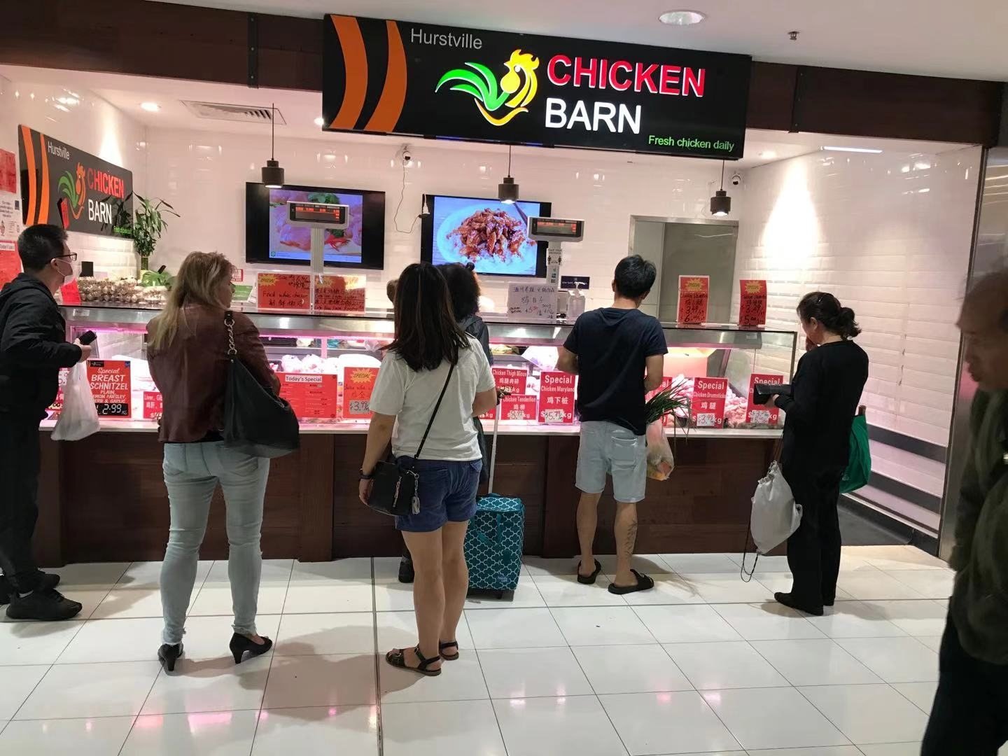 Customers shopping at Hurstville Chicken Barn